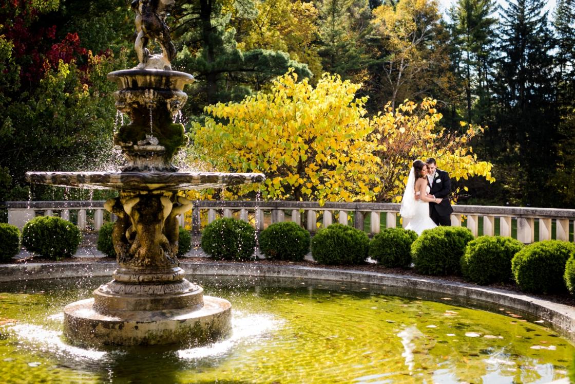 Fall photograph of a bride and groom at Cranbrook Gardens. Photo by FutureWave Images.