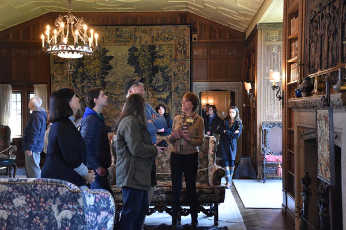 Photograph of a Cranbrook House docent giving a tour of the Library.
